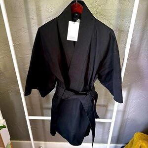 New, never worn, tags on